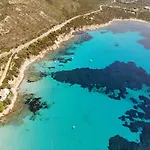 Eco Village Baia Delle Ginestre מלון דירות 4*